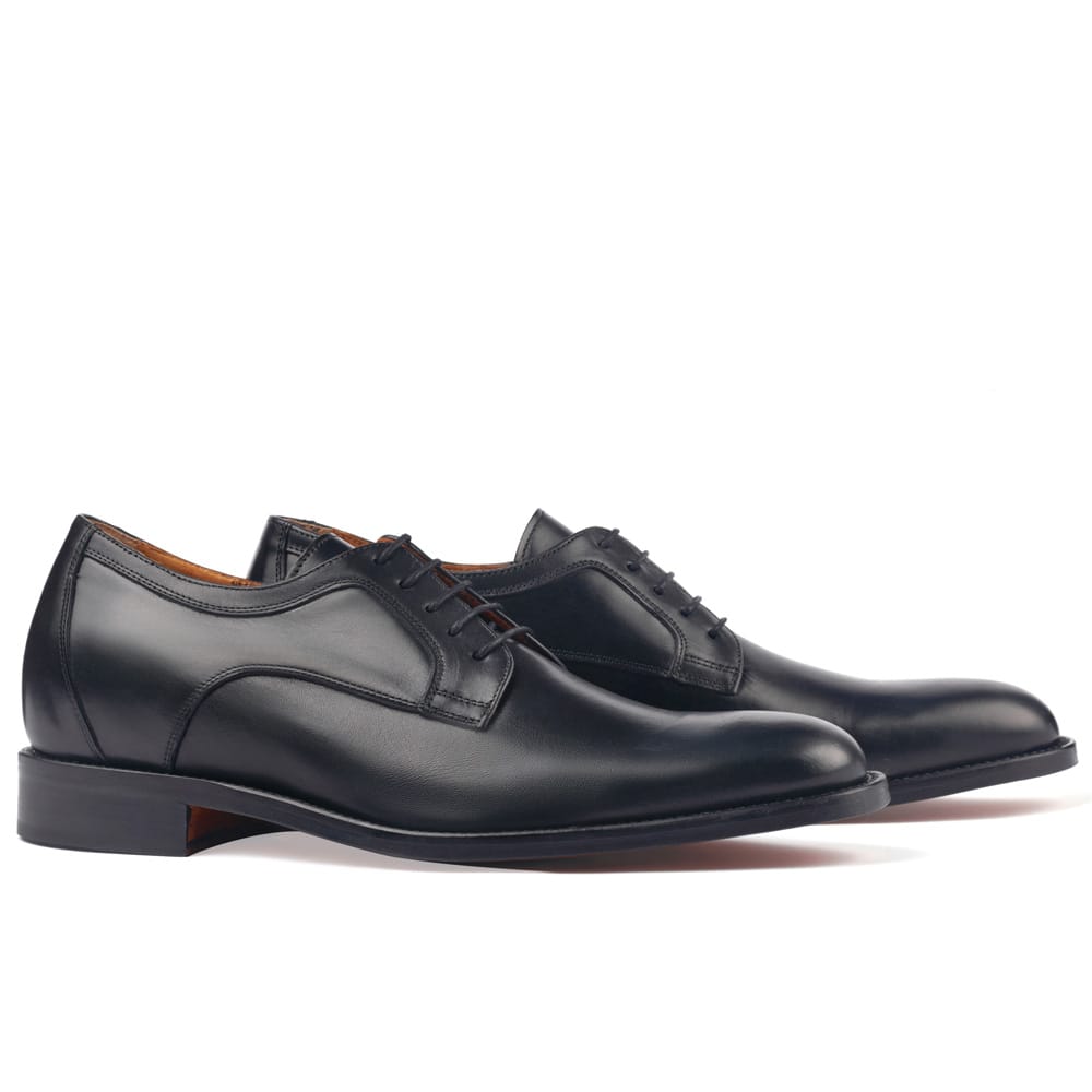 Height increasing shoes. Tafilete calfskin exterior. Interior fully lined in fine leather.